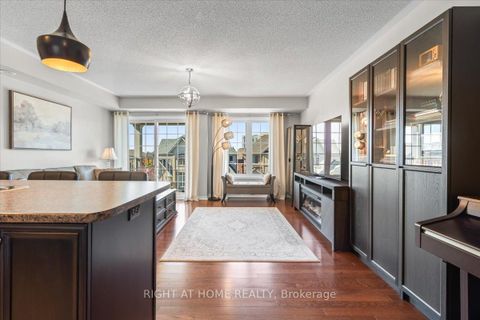 Photo 7 at 11 - 149 Isaac Devins Boulevard, Pelmo Park W5, Toronto