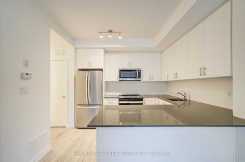 Photo 10 at 28 - 18 Lytham Green Circle, Glenway Estates, Newmarket