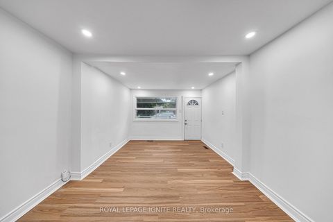 Photo 8 at 148 Barrington Avenue, Crescent Town, Toronto