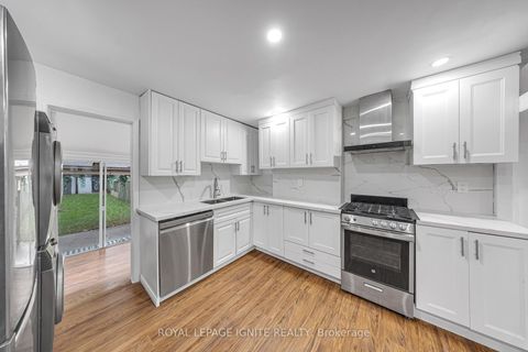 Photo 9 at 148 Barrington Avenue, Crescent Town, Toronto