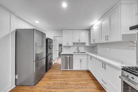 Photo 10 at 148 Barrington Avenue, Crescent Town, Toronto