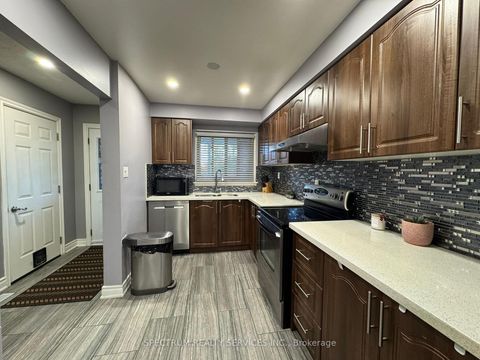 Photo 6 at 43 Mammoth Hall Trail, Malvern, Toronto