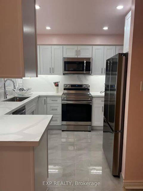 Photo 9 at 1070 Queens Avenue, CP College Park, Oakville