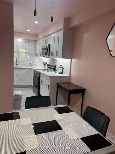 Photo 10 at 1070 Queens Avenue, CP College Park, Oakville