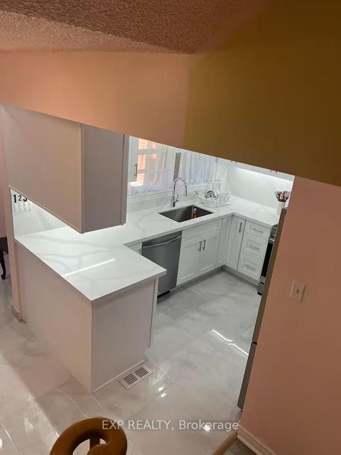 Photo 11 at 1070 Queens Avenue, CP College Park, Oakville