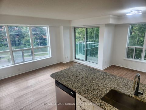 Photo 9 at 211 - 60 Fairfax Crescent, Birchmount, Toronto