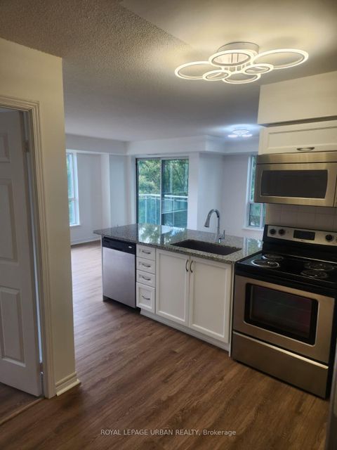 Photo 11 at 211 - 60 Fairfax Crescent, Birchmount, Toronto