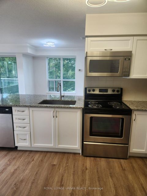 Photo 12 at 211 - 60 Fairfax Crescent, Birchmount, Toronto