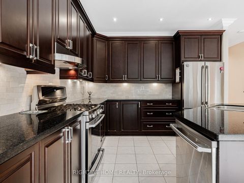 Photo 11 at 67 Timna Crescent, Patterson, Vaughan