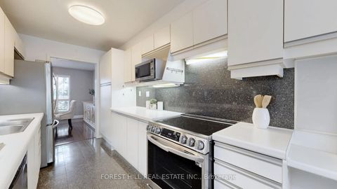 Photo 9 at 53 - 33 Proudbank Millway Way, Windfields, Toronto