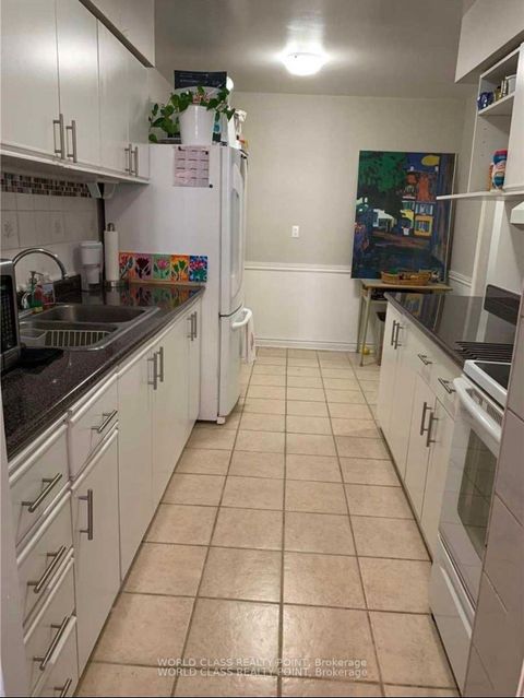 Photo 5 at 807 - 3420 Eglinton Avenue E, Scarborough Village, Toronto