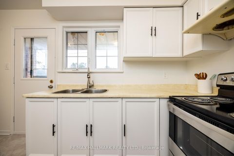 Photo 10 at 12 Outlook Garden Boulevard, Smythe, Toronto