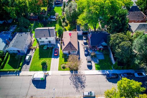Photo 2 at 21 Brenton Street, Crescent Town, Toronto