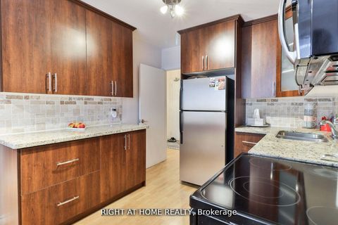 Photo 1 at 12 - 50 Three Valleys Drive, Donalda, Toronto