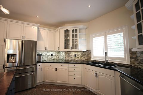 Photo 13 at 17 Duncton Wood Crescent, Hills of St Andrew, Aurora