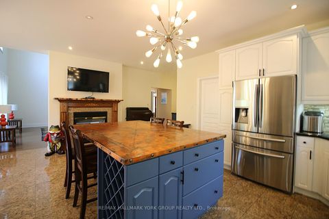 Photo 14 at 17 Duncton Wood Crescent, Hills of St Andrew, Aurora