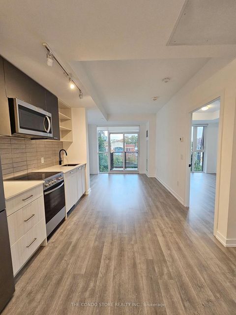Photo 2 at 334 - 2300 St Clair Avenue W, Junction Area, Toronto