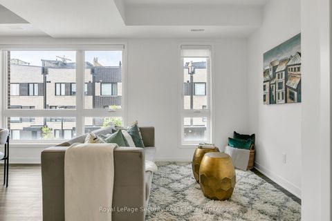 Photo 9 at TH 22 - 40 Ed Clark Gardens, Pellam Park, Toronto