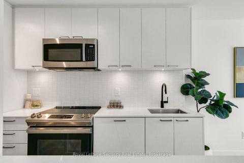 Photo 19 at TH 22 - 40 Ed Clark Gardens, Pellam Park, Toronto