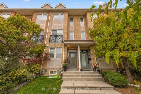 Photo 1 at 12 Market Garden Mews, Queensway, Toronto