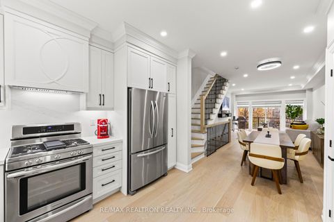 Photo 3 at 12 Market Garden Mews, Queensway, Toronto