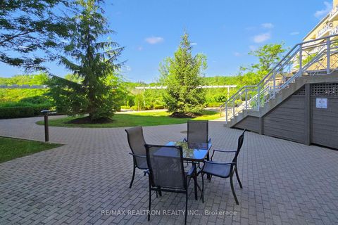 Photo 41 at 123 - 80 Burns Boulevard N, King City, King