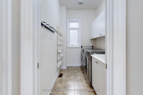 Photo 12 at 36 Strawbridge Farm Drive, Aurora Grove, Aurora