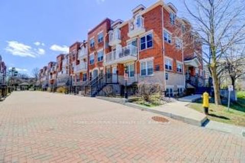 Photo 1 at 8 - 37 Four Winds Drive, York University Heights, Toronto