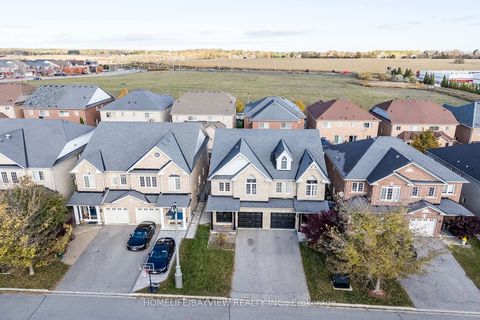 Photo 1 at 61 Four Seasons Crescent, Woodland Hill, Newmarket