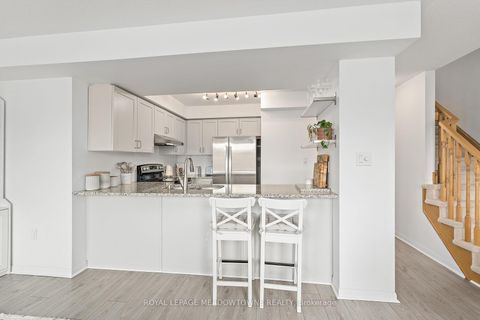 Photo 12 at 42 - 2614 Dashwood Drive, WT West Oak Trails, Oakville