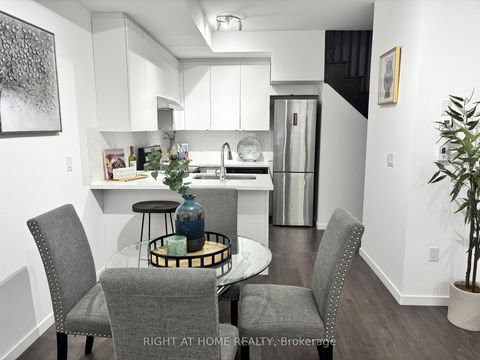 Photo 7 at 59 - 300 Alex Gardner Circle E, Aurora Village, Aurora