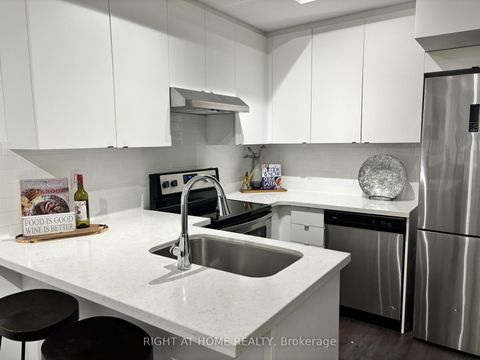 Photo 9 at 59 - 300 Alex Gardner Circle E, Aurora Village, Aurora