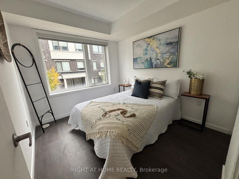 Photo 10 at 59 - 300 Alex Gardner Circle E, Aurora Village, Aurora