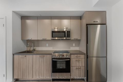 Photo 11 at TH 103 - 2301 Danforth Avenue, Danforth, Toronto