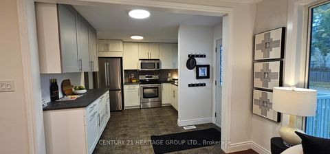 Photo 2 at 67 Savona Drive, Alderwood, Toronto