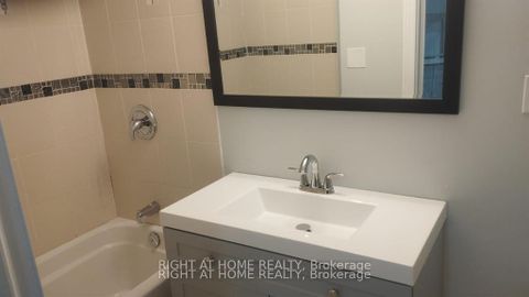 Photo 5 at 32 CONLINS RD E, Highland Creek, Toronto