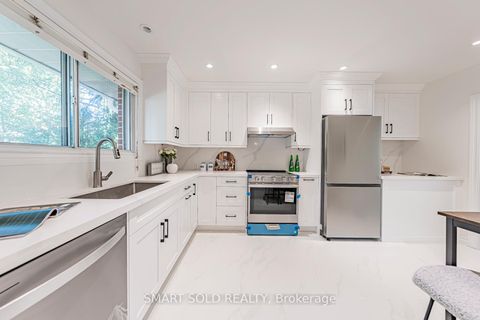 Photo 10 at 42 Davean Drive, Windfields, Toronto