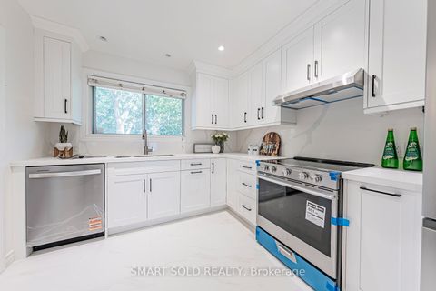 Photo 11 at 42 Davean Drive, Windfields, Toronto