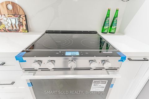 Photo 13 at 42 Davean Drive, Windfields, Toronto