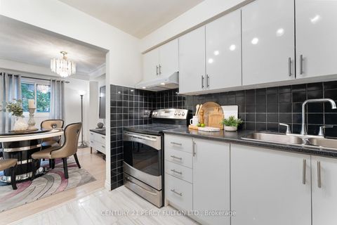 Photo 16 at 1 - 34 Dundalk Drive, Dorset Park, Toronto