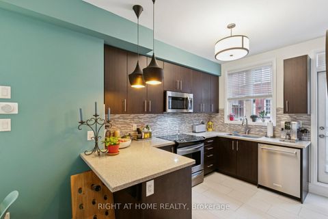 Photo 12 at 28 Raffeix Lane, Moss Park, Toronto