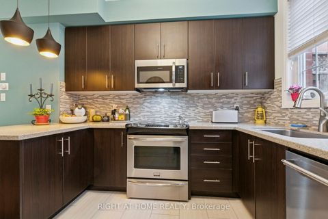 Photo 13 at 28 Raffeix Lane, Moss Park, Toronto