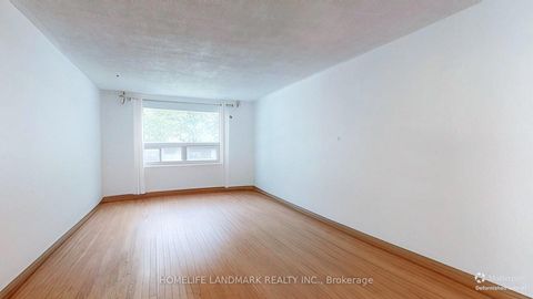 Photo 6 at 313 Hollyberry Trail, Hillcrest Village, Toronto