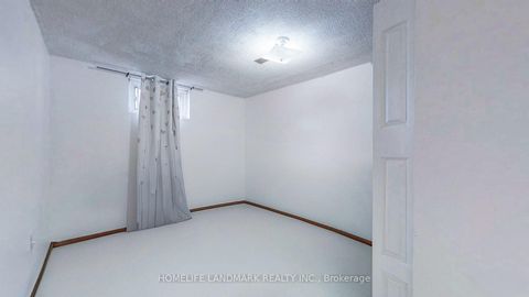 Photo 23 at 313 Hollyberry Trail, Hillcrest Village, Toronto