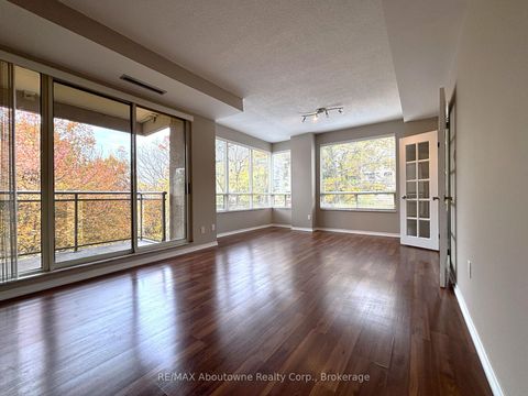 Photo 1 at 406 - 2511 Lakeshore Road W, BR Bronte, Oakville