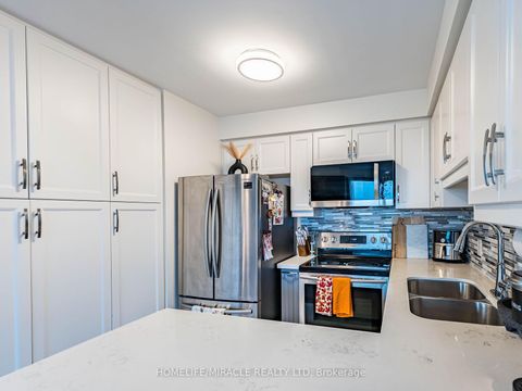 Photo 21 at 2003 - 38 Lee Centre Drive, Woburn, Toronto