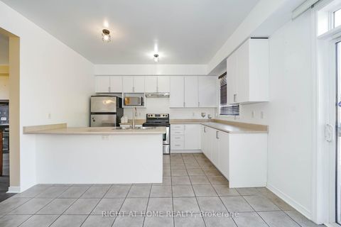 Photo 7 at 48 Curran Hall Crescent, Morningside, Toronto