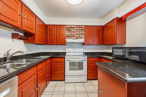 Photo 22 at 86 Village Greenway, Henry Farm, Toronto