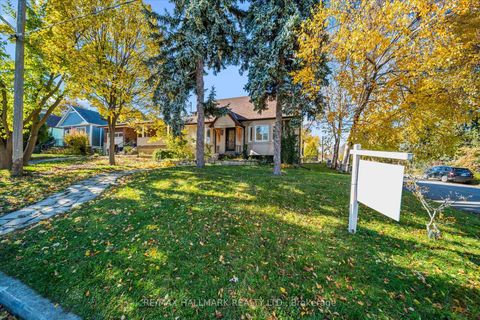 Photo 1 at 128 Harewood Avenue, Cliffcrest, Toronto