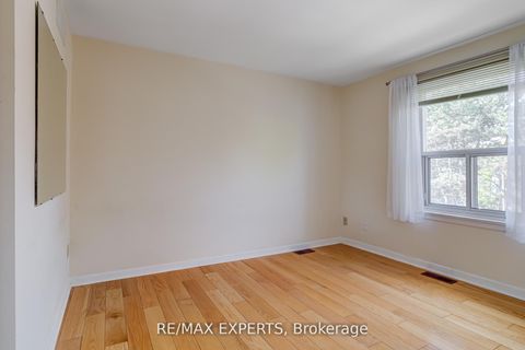 Photo 17 at 23 Thimble Berry Way, Hillcrest Village, Toronto